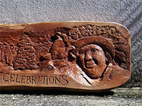 Mayday celebration plaque; yew - 34 inches long.